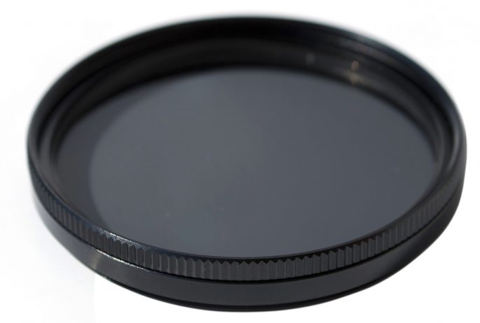 A polarizing filter has dual uses